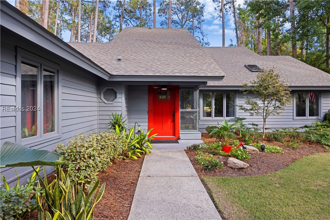 Inviting front entry with beautiful landscaping ne