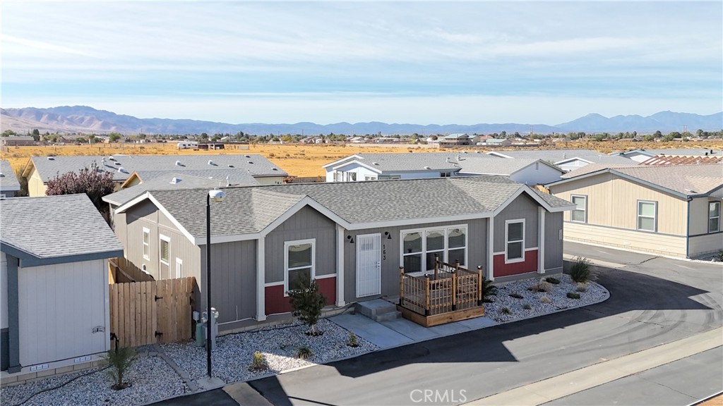 a aerial view of a house with a ocean view