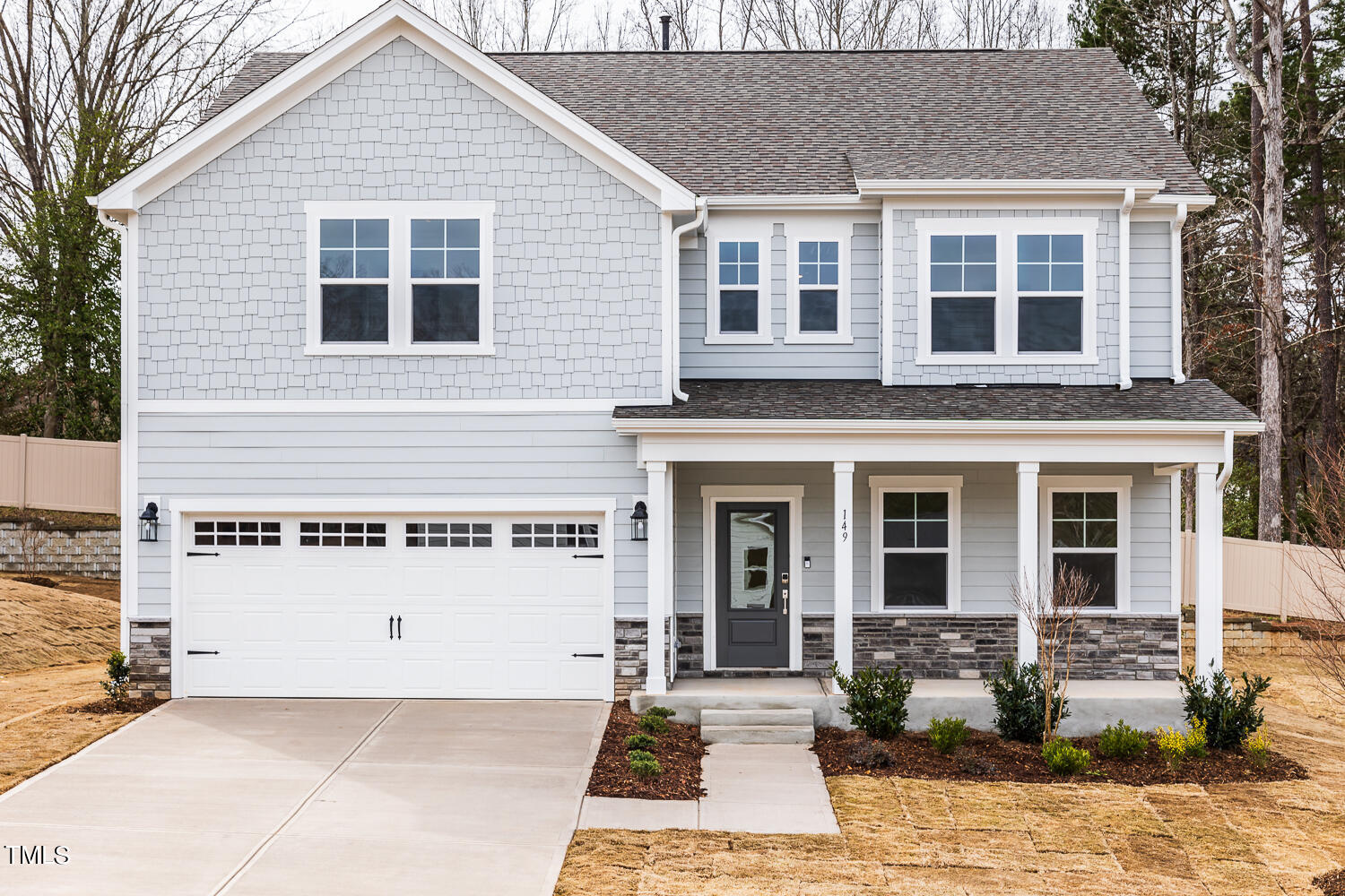 a front view of a house with yard