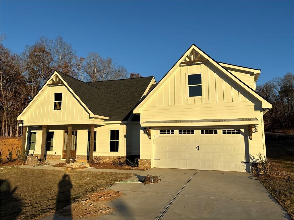 a view of house with yard