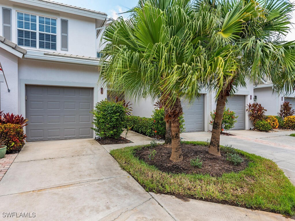 a house with trees in front of it