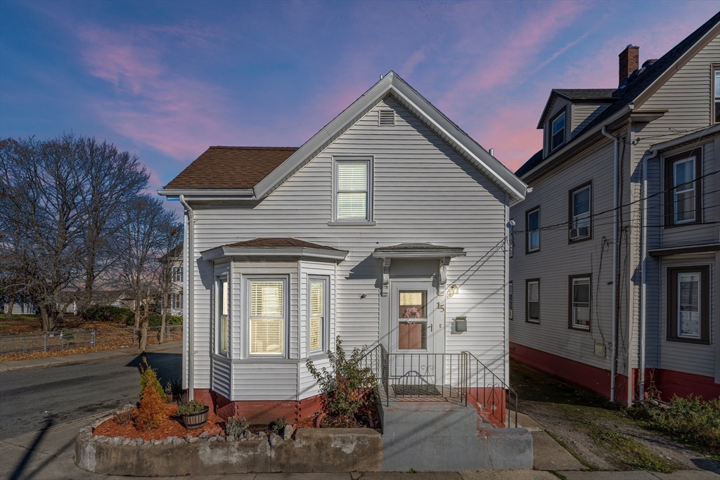 a front view of a house with a porch