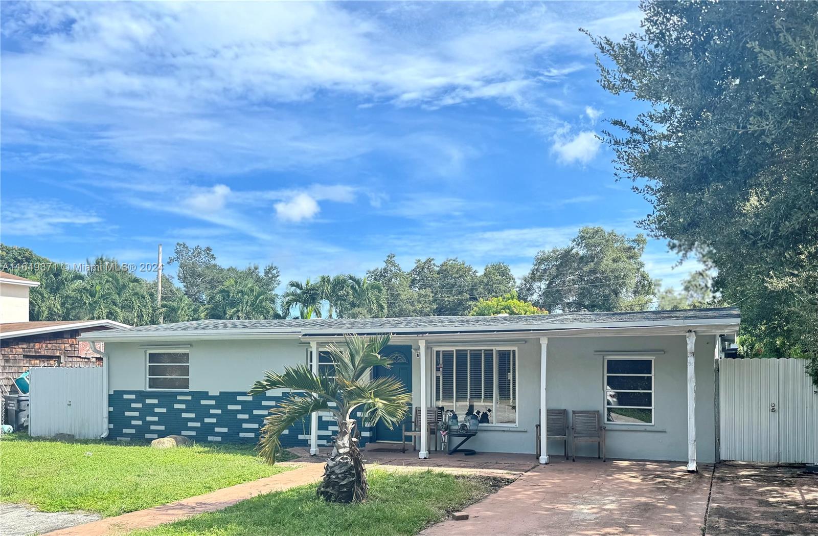 front view of house with a yard