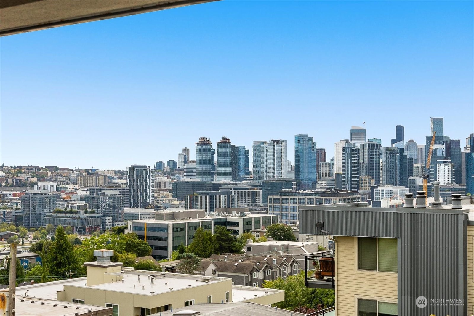 a view of a city with tall buildings