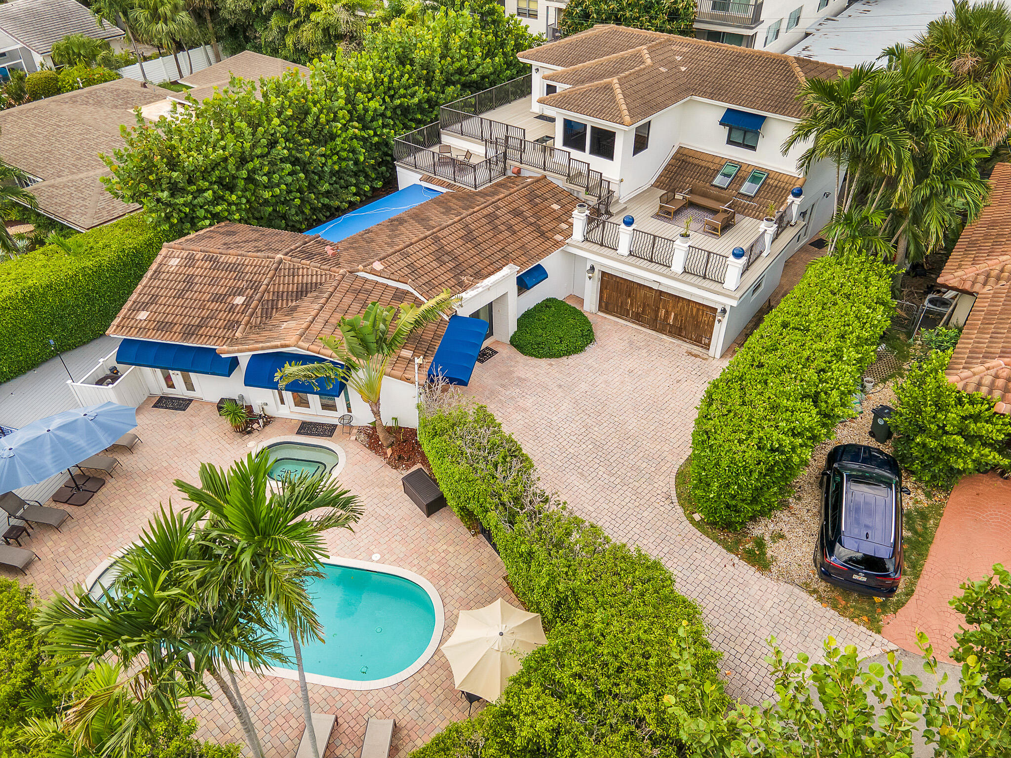 an aerial view of house with yard