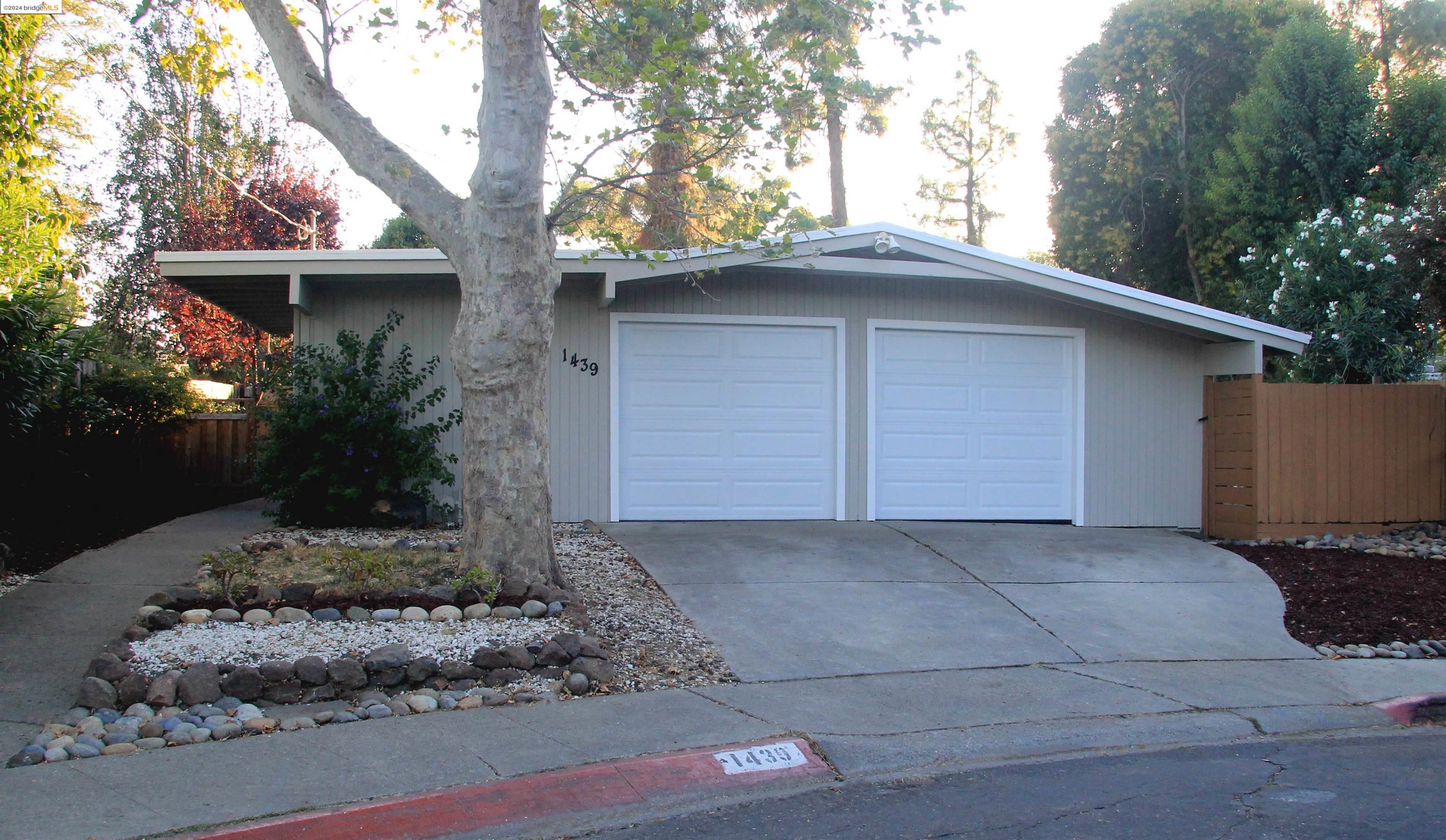 a front view of house with yard