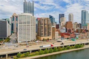 a view of a city with tall buildings