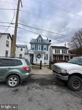 a front view of a car with garage