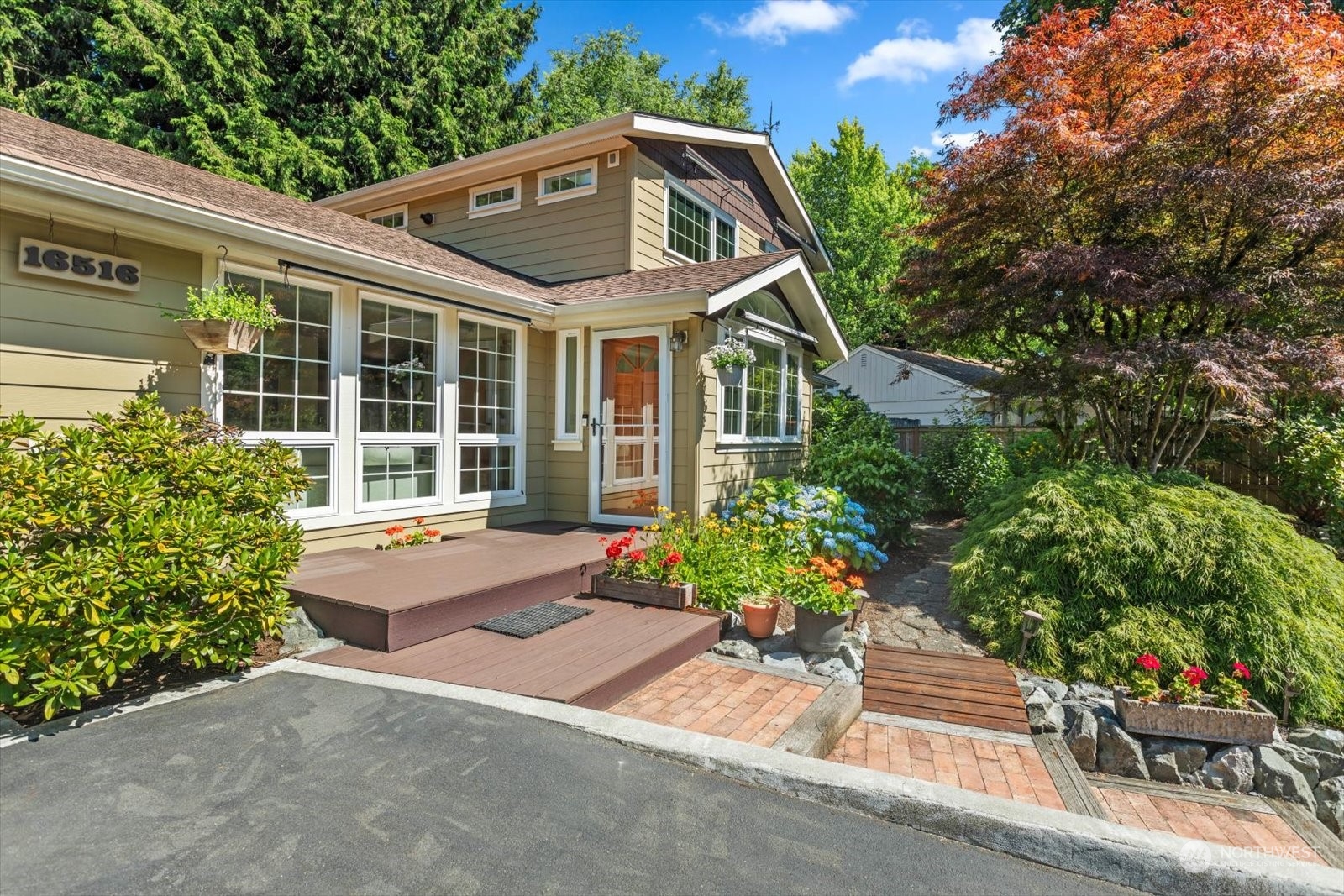 front view of a house with a yard