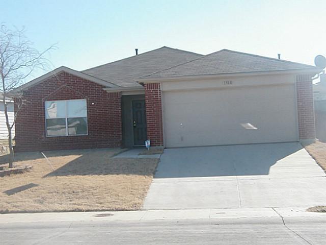 a view of house with garage