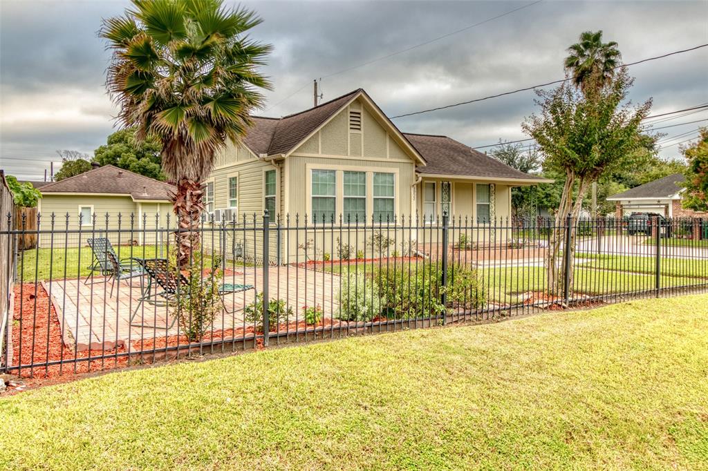 a front view of a house with a outdoor space