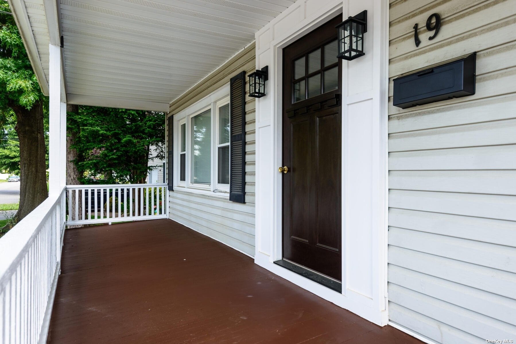 a view of a house with a porch