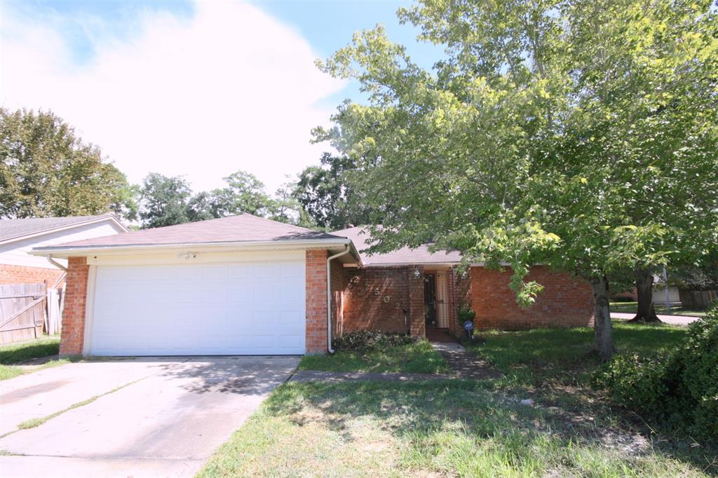 a front view of house with a yard