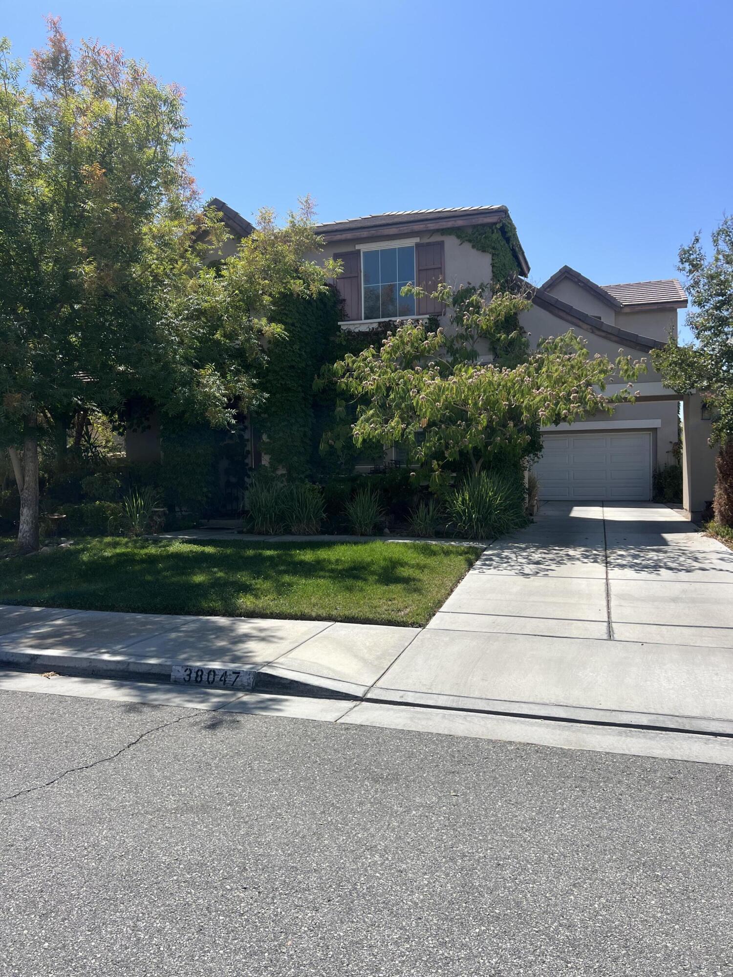 a front view of house with yard