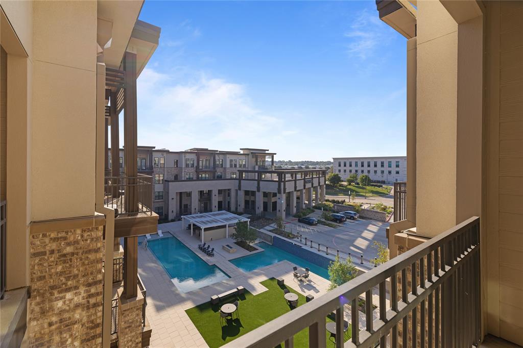 a view of balcony with furniture