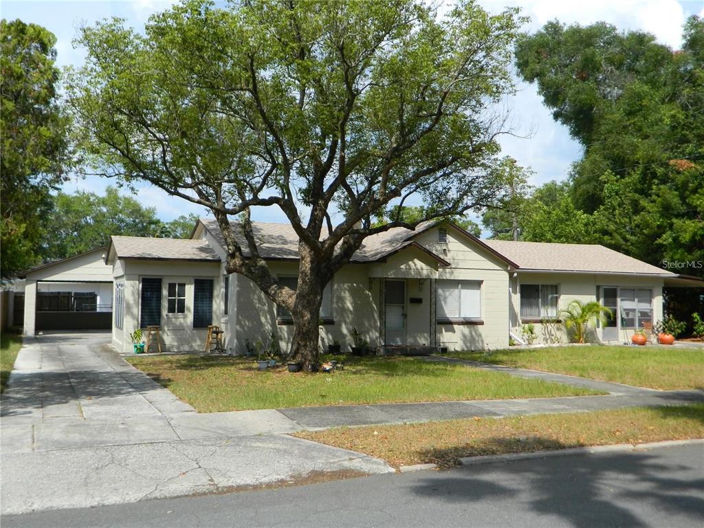 a view of a house with a swimming pool