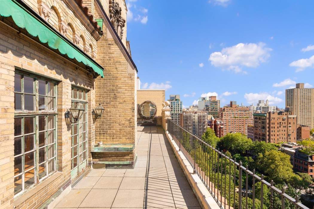 a view of a balcony with city view