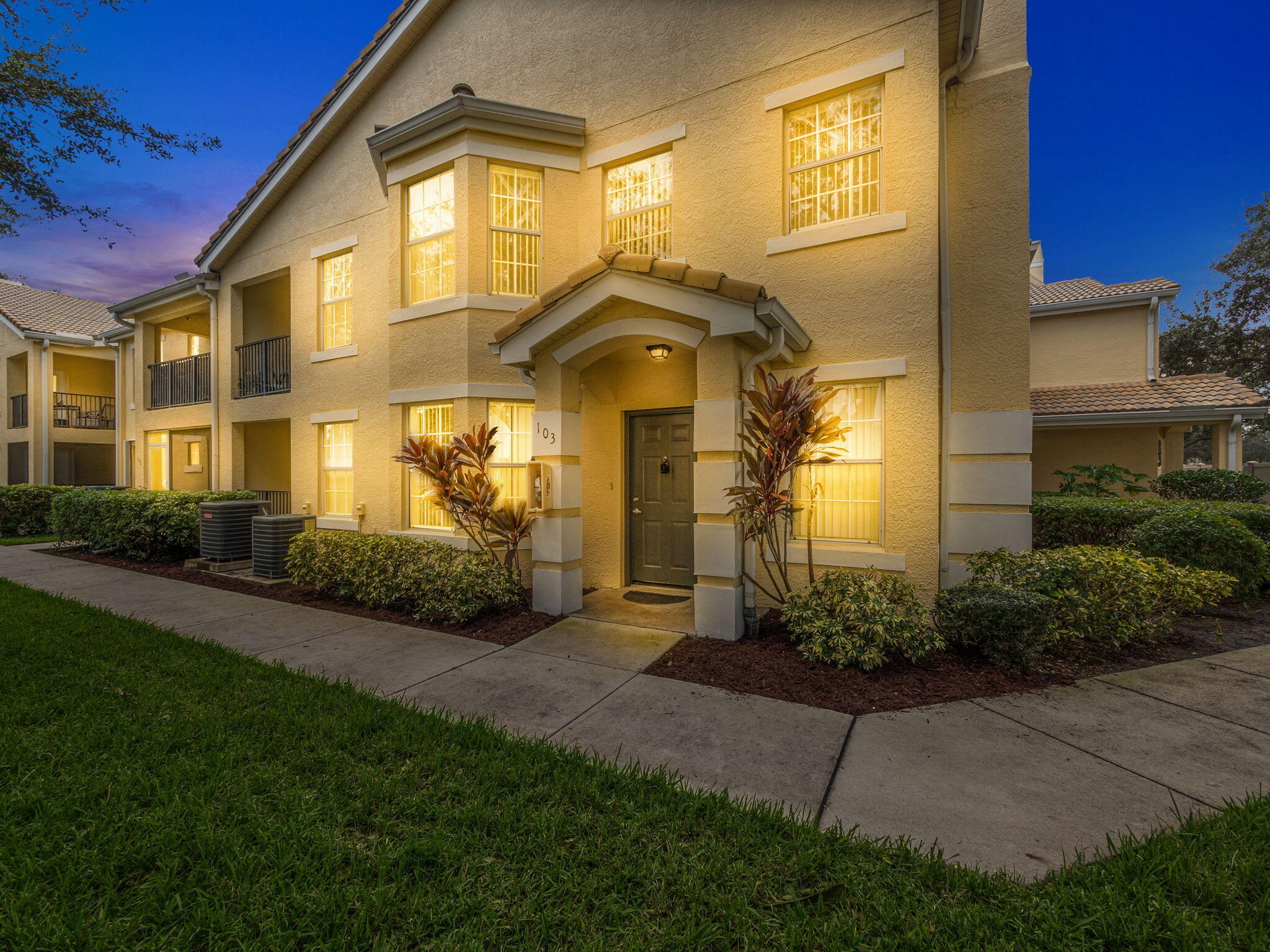 a front view of a house having yard