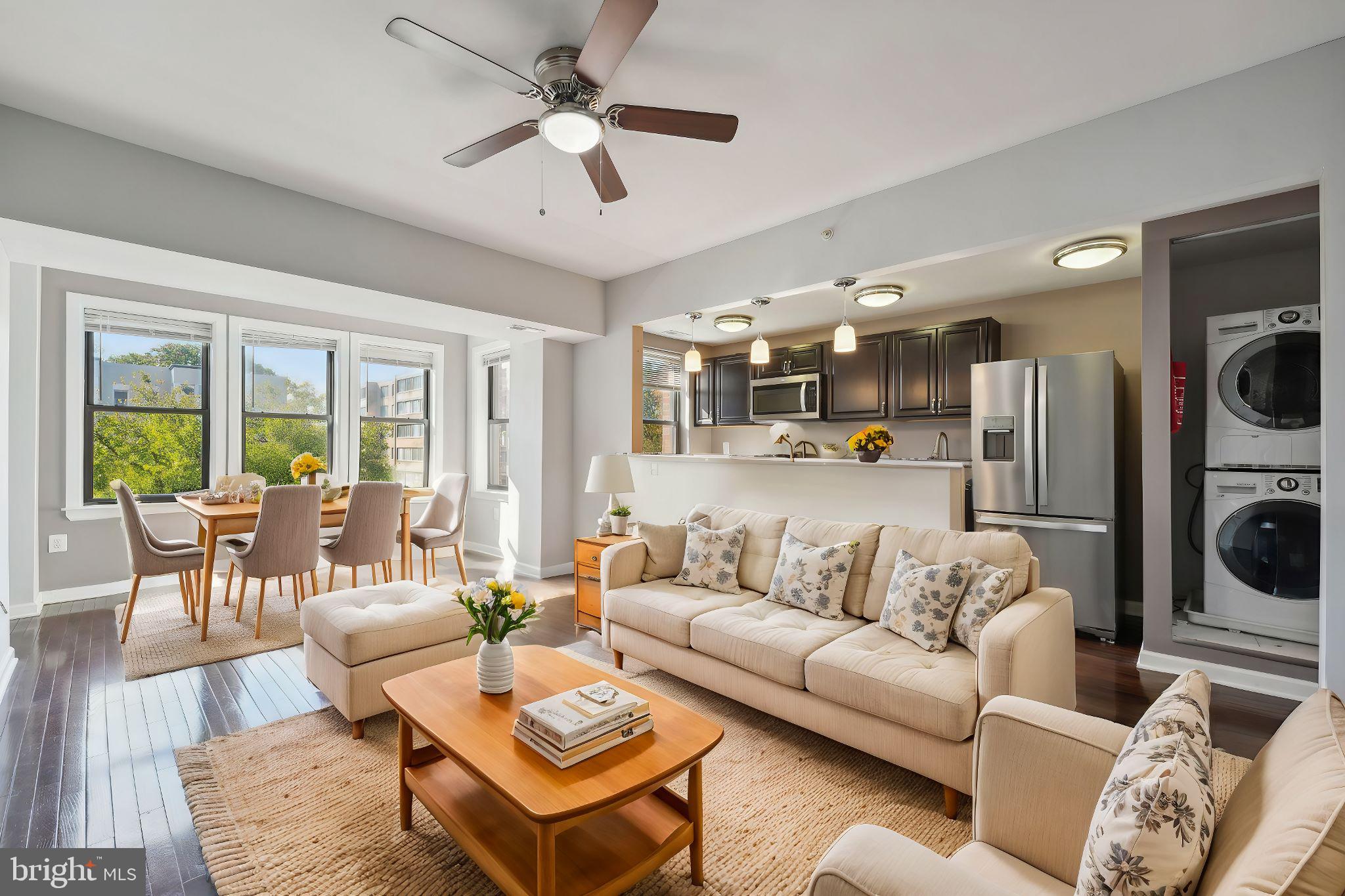 a living room with furniture or outdoor view and a large window