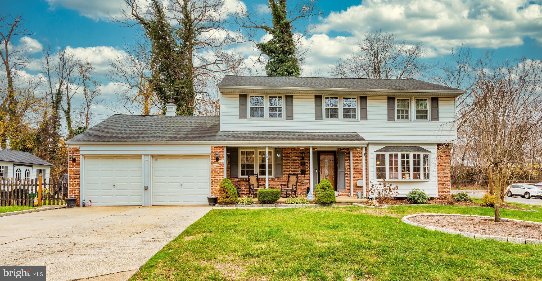 front view of house with a yard