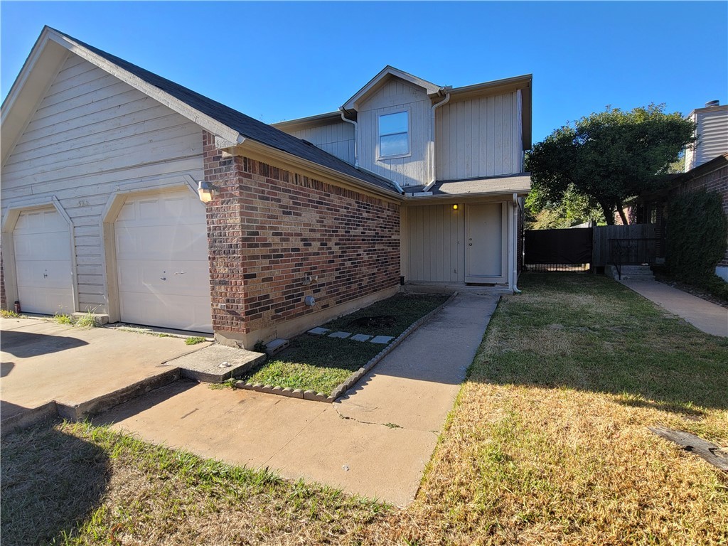 a front view of house with yard