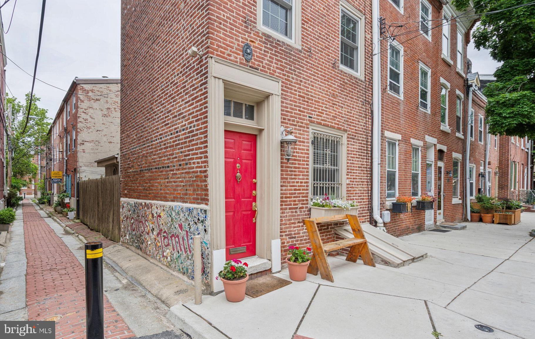 a view of a brick building with many windows