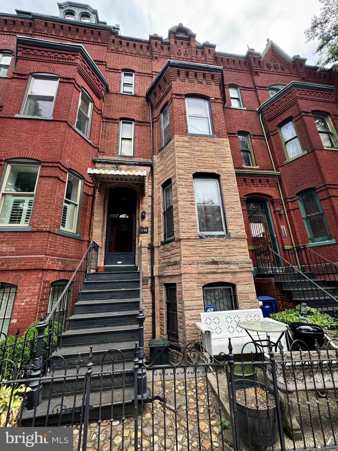 a front view of a multi story residential apartment building