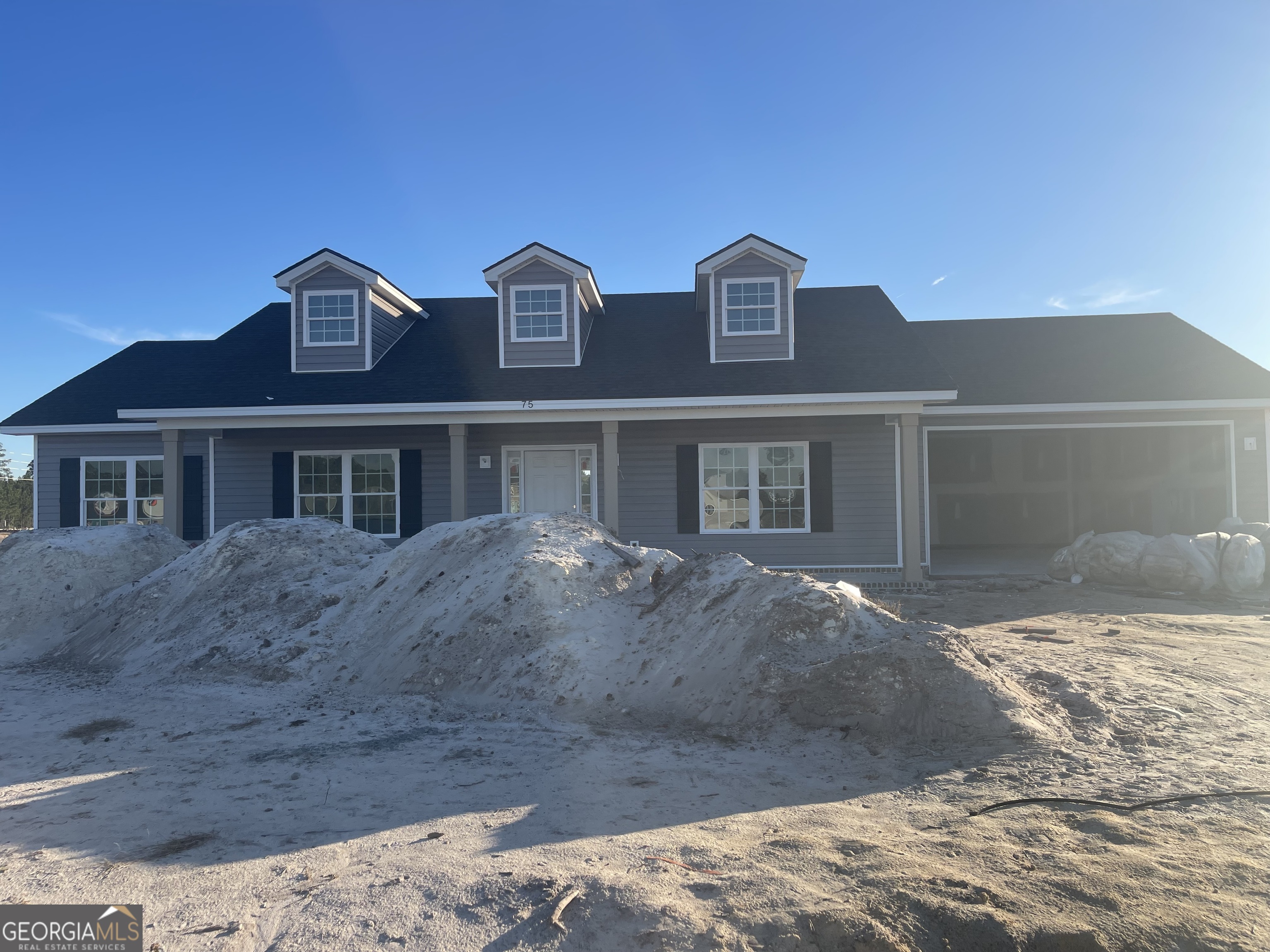 a front view of house with yard