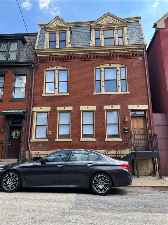 a car parked in front of a building