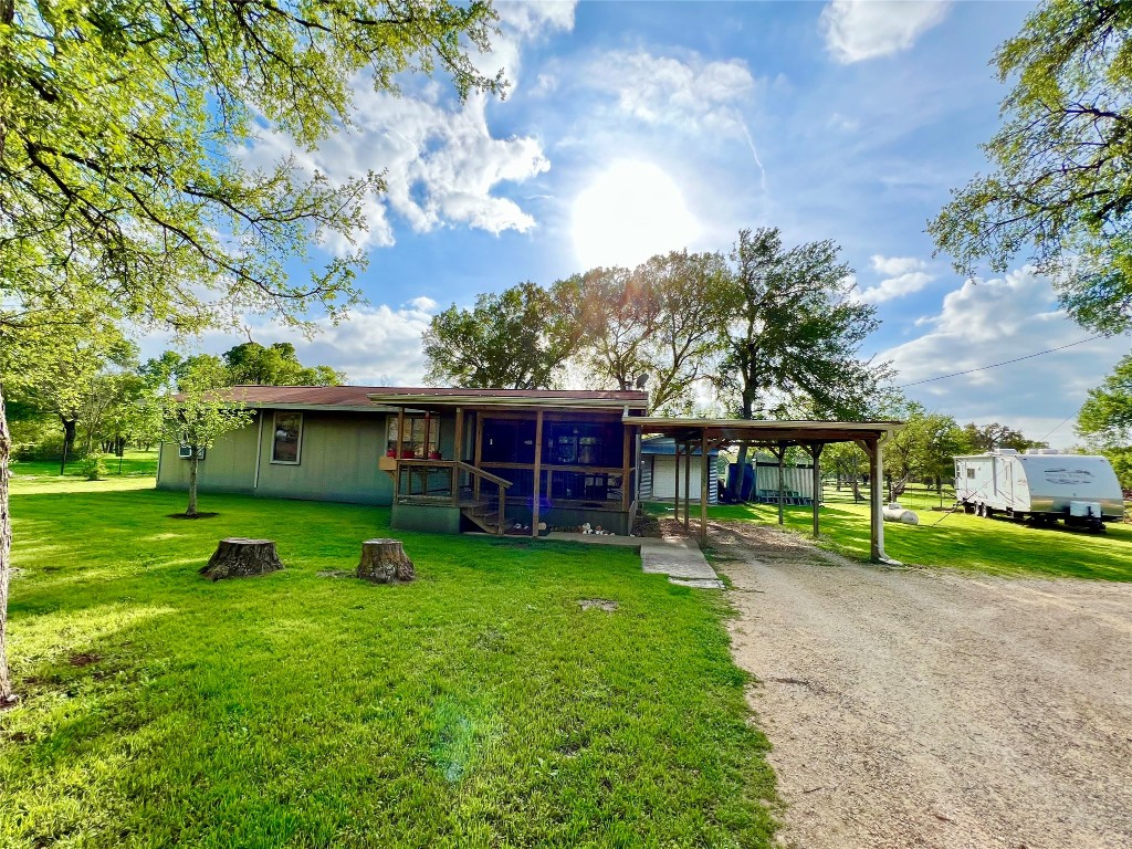 a view of a yard in front of house