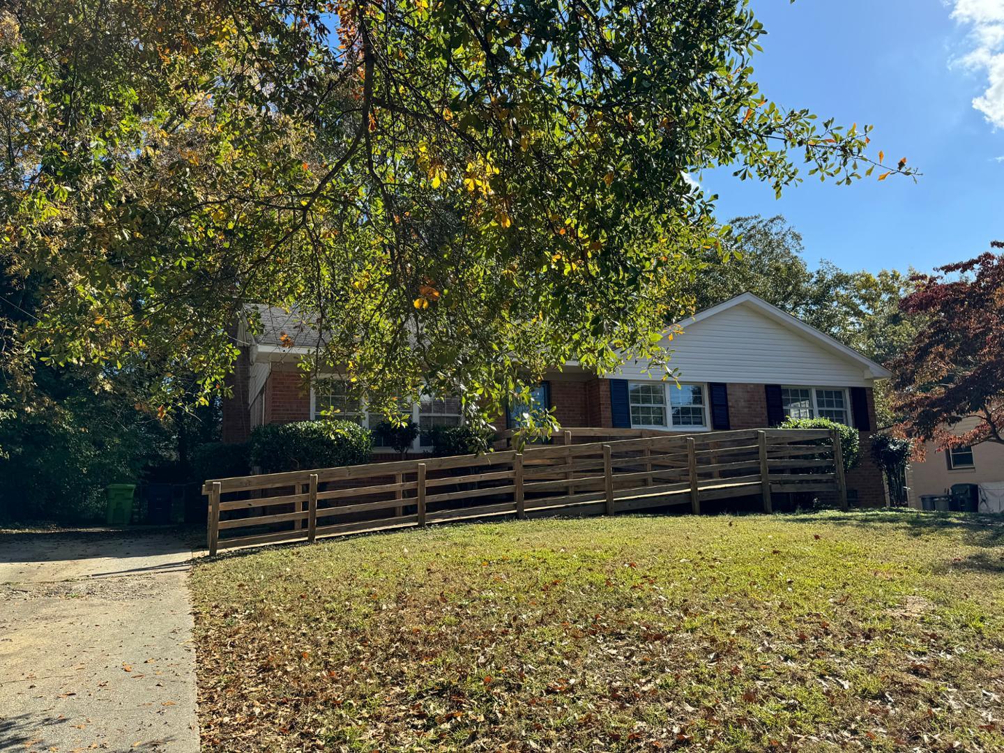 a house view with a garden space