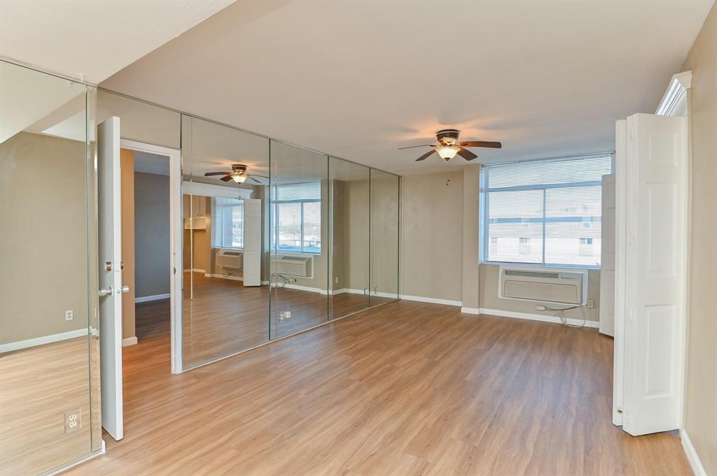 a view of a livingroom with a hardwood floor