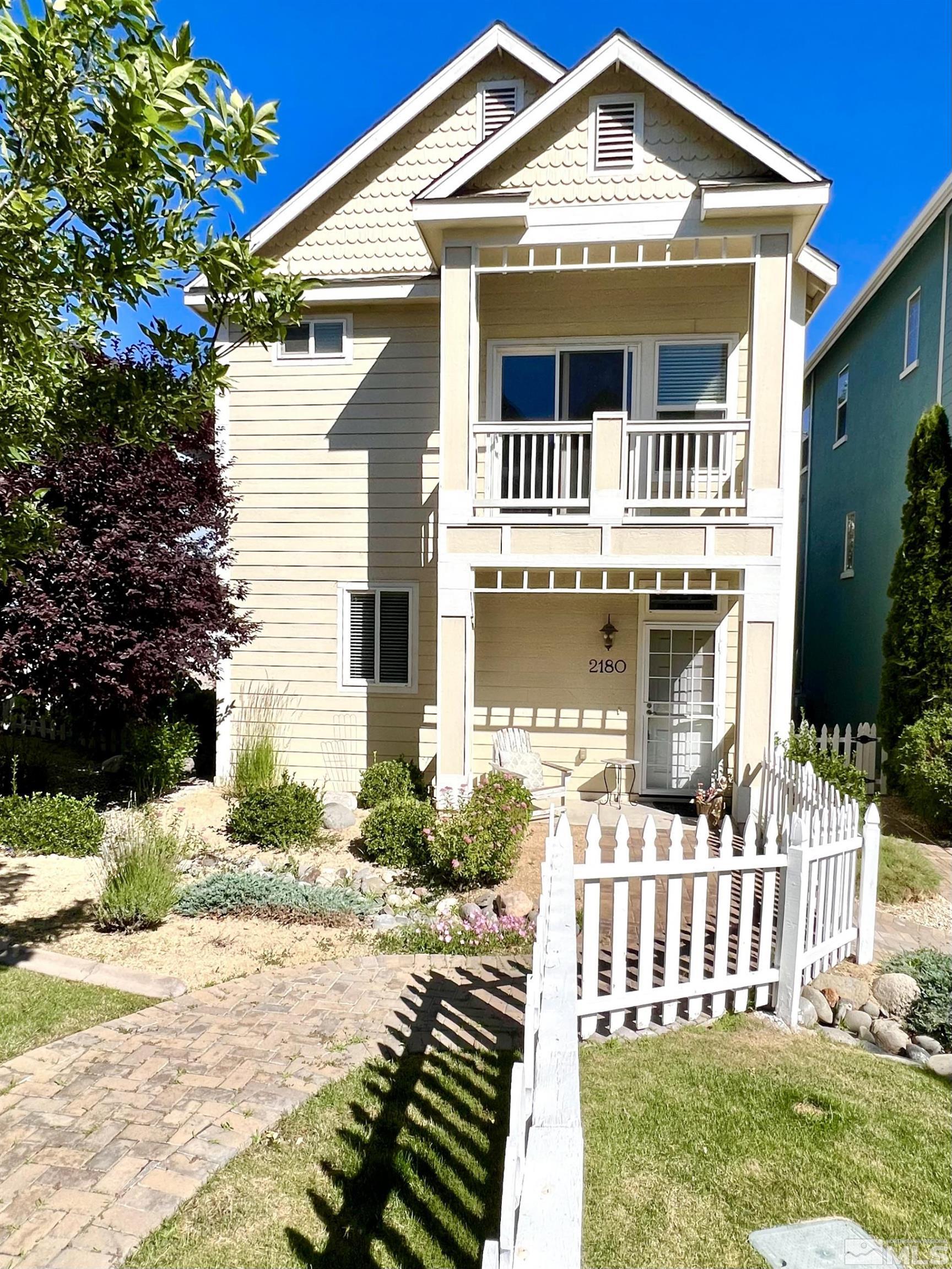 a front view of a house with a porch