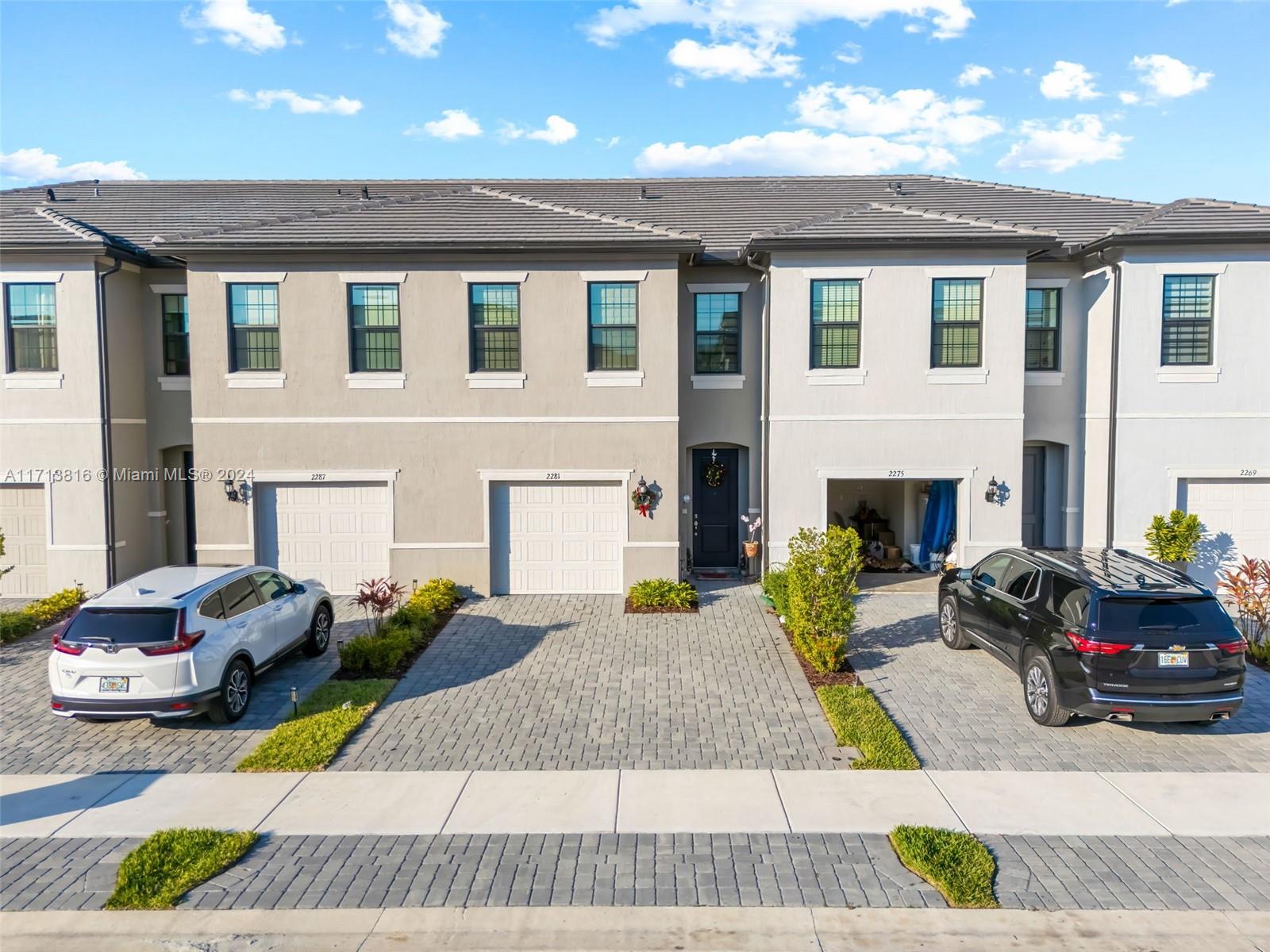 a front view of a house with patio