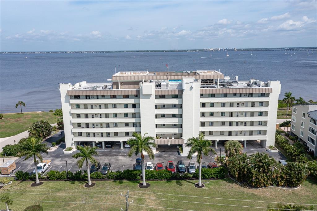 a front view of a building with garden