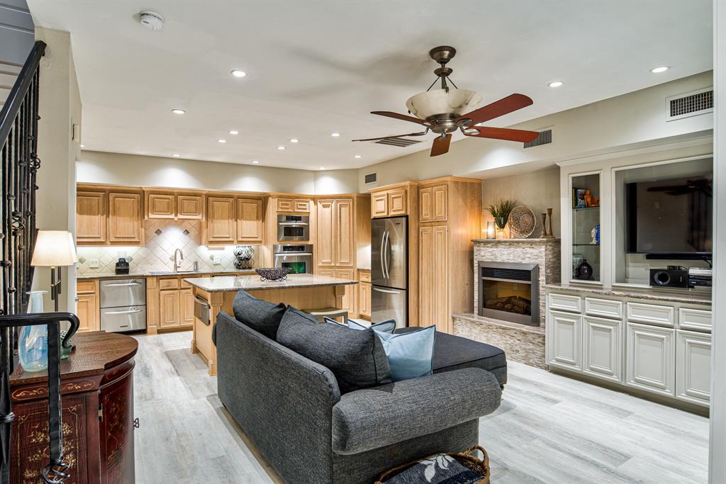 Step in from the front door to this beautiful living room open to the kitchen.