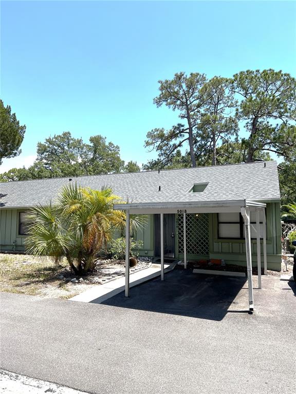 a view of a house with a patio