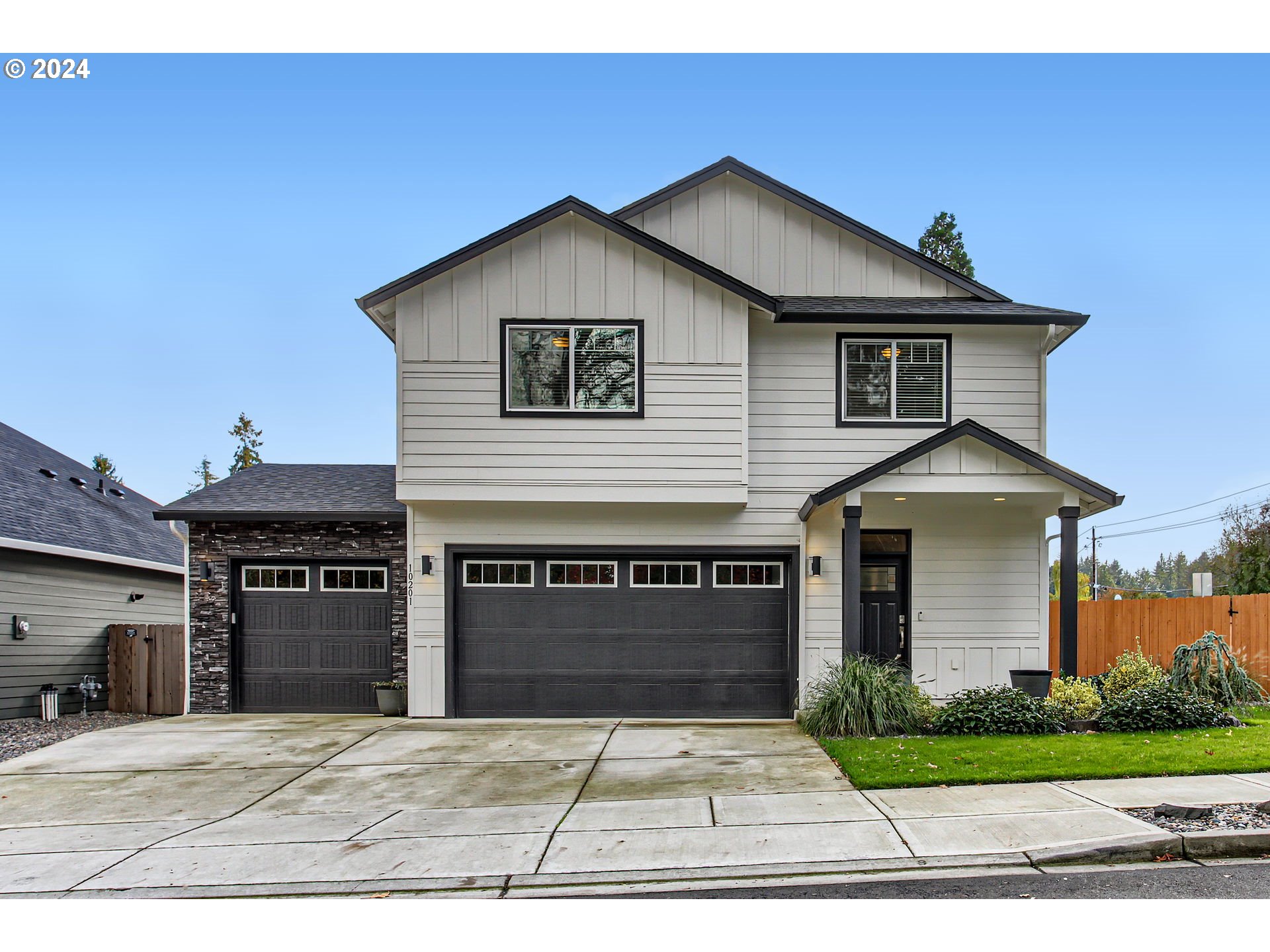 a front view of a house with a garage