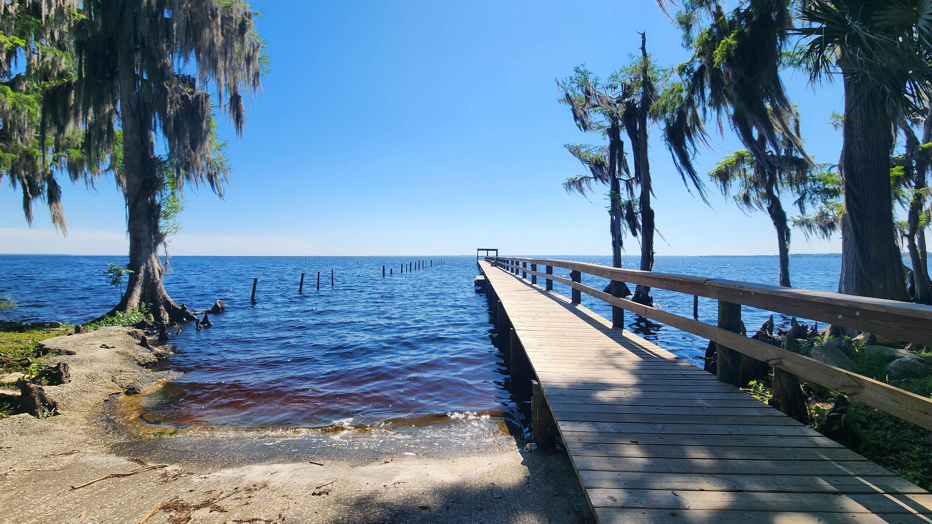 a view of wooden floor with a lake