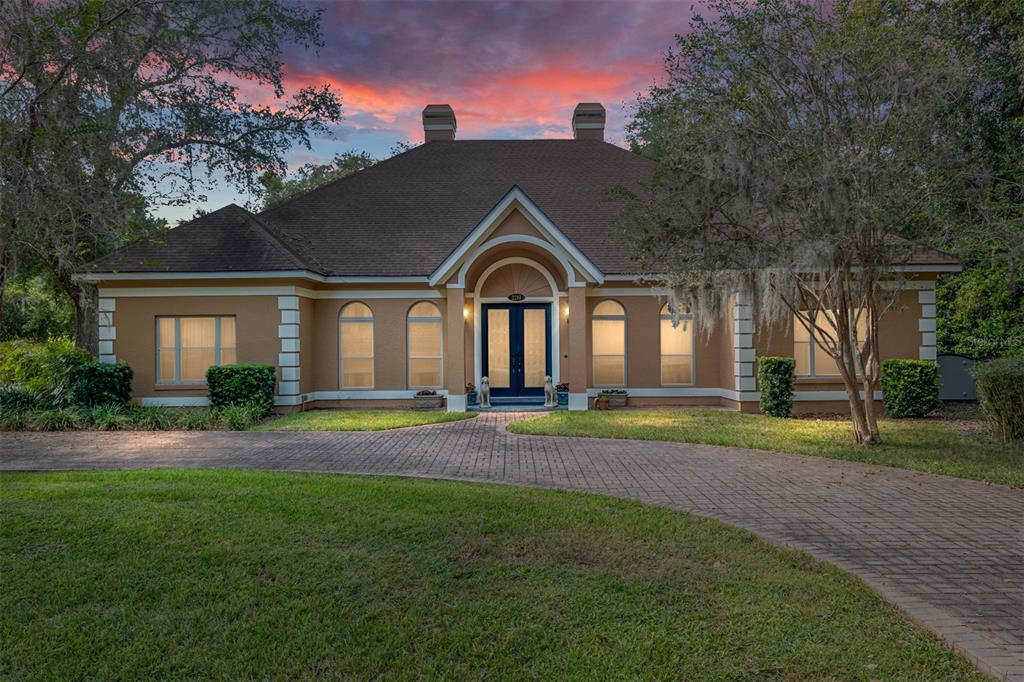 a house view with a garden space