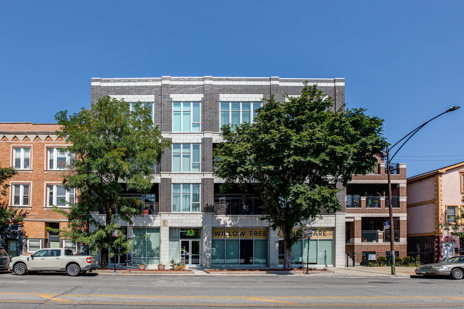 a front view of a building with street view