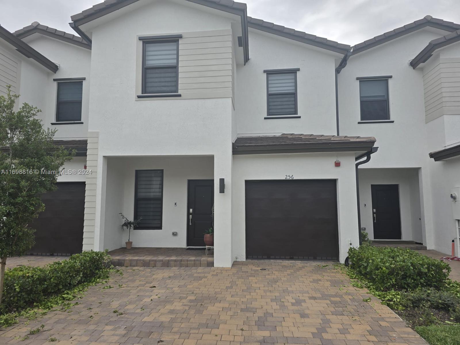 front view of a house with an empty space