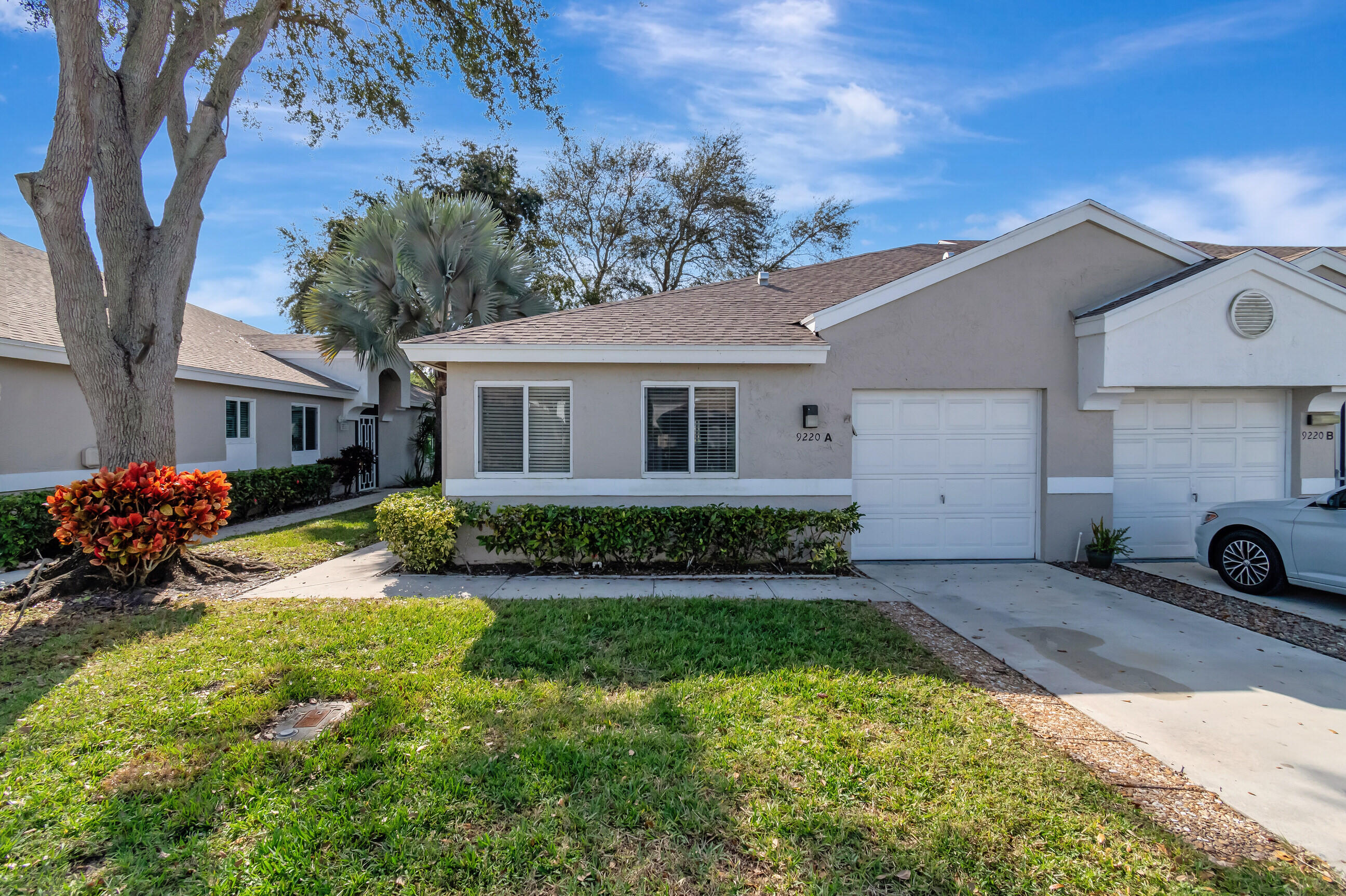 front view of a house with a big yard