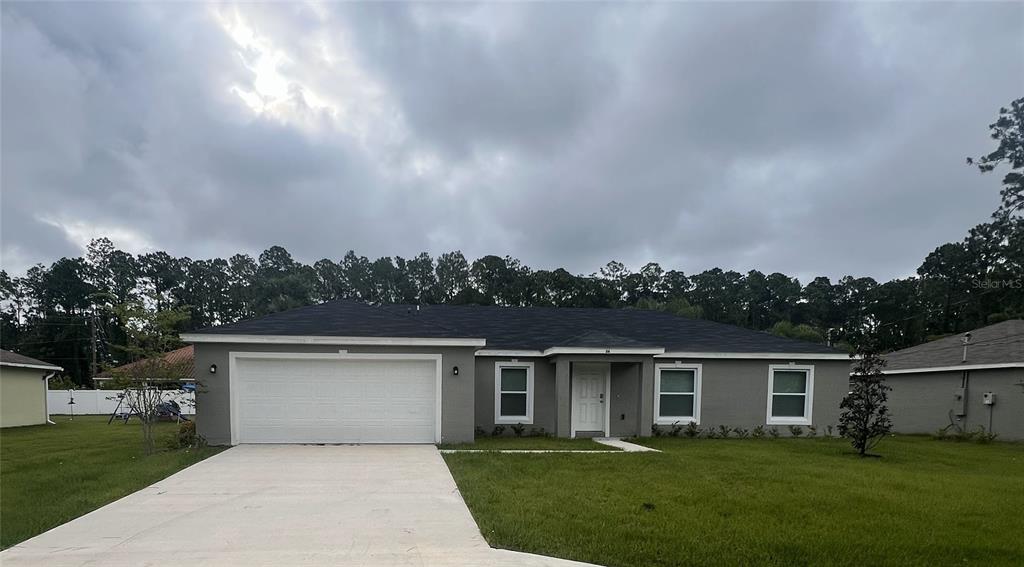 front view of house with a yard