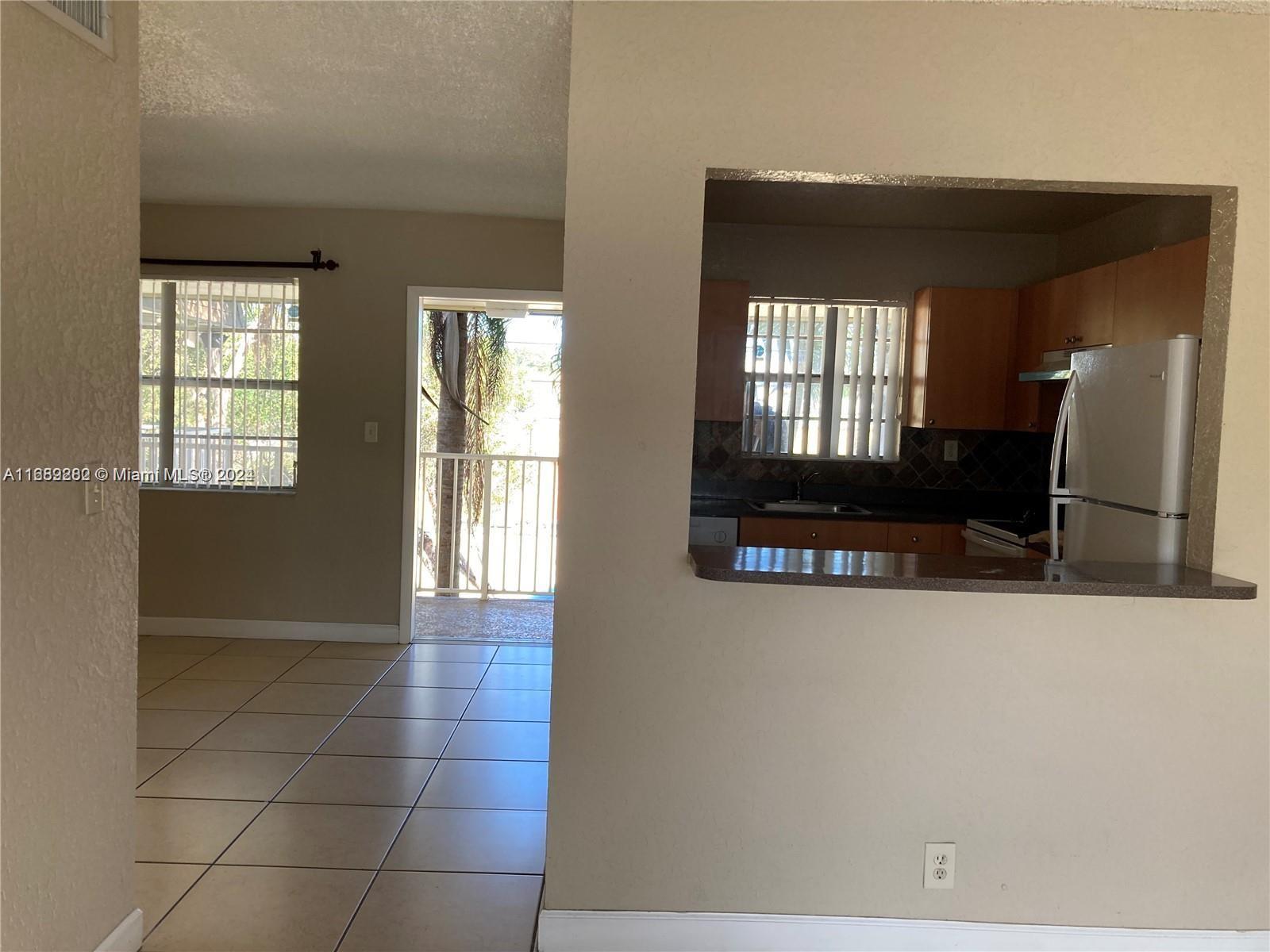 a view of a living room washer and dryer