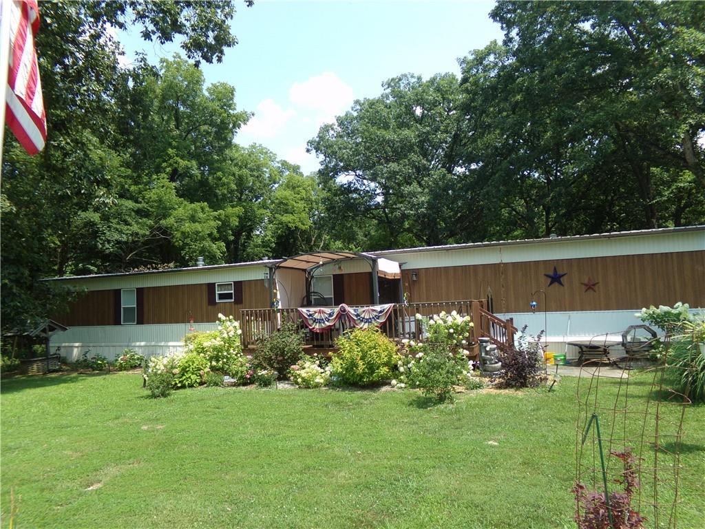 a view of a garden in front of a house