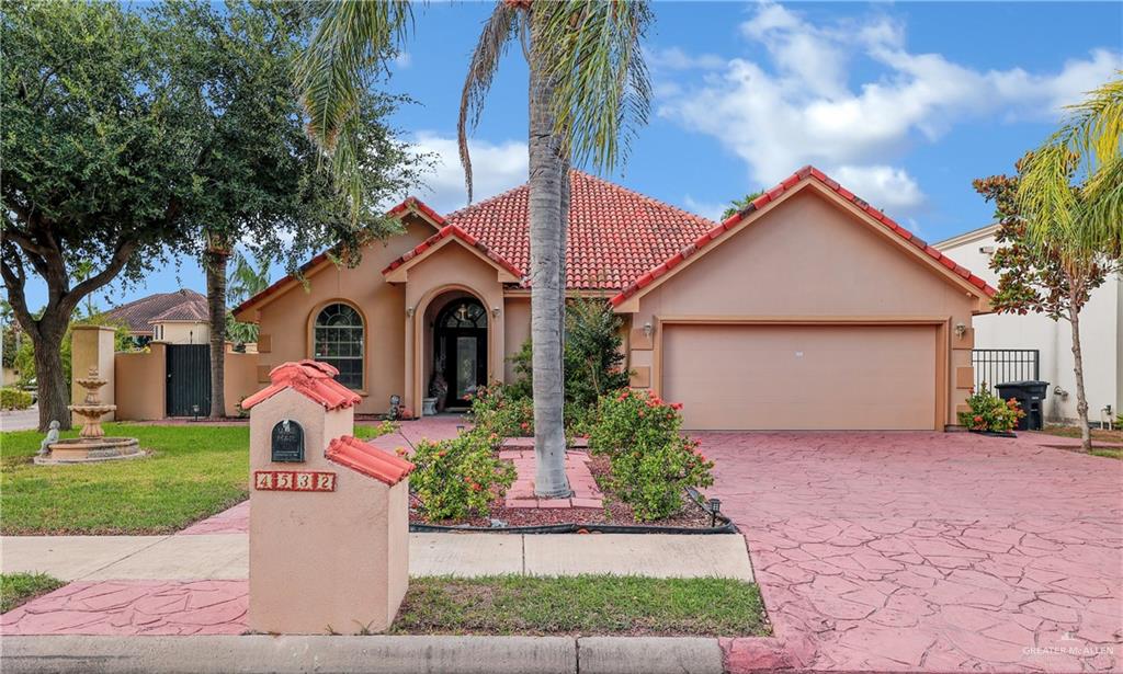 Mediterranean / Spanish home with clay tile roof