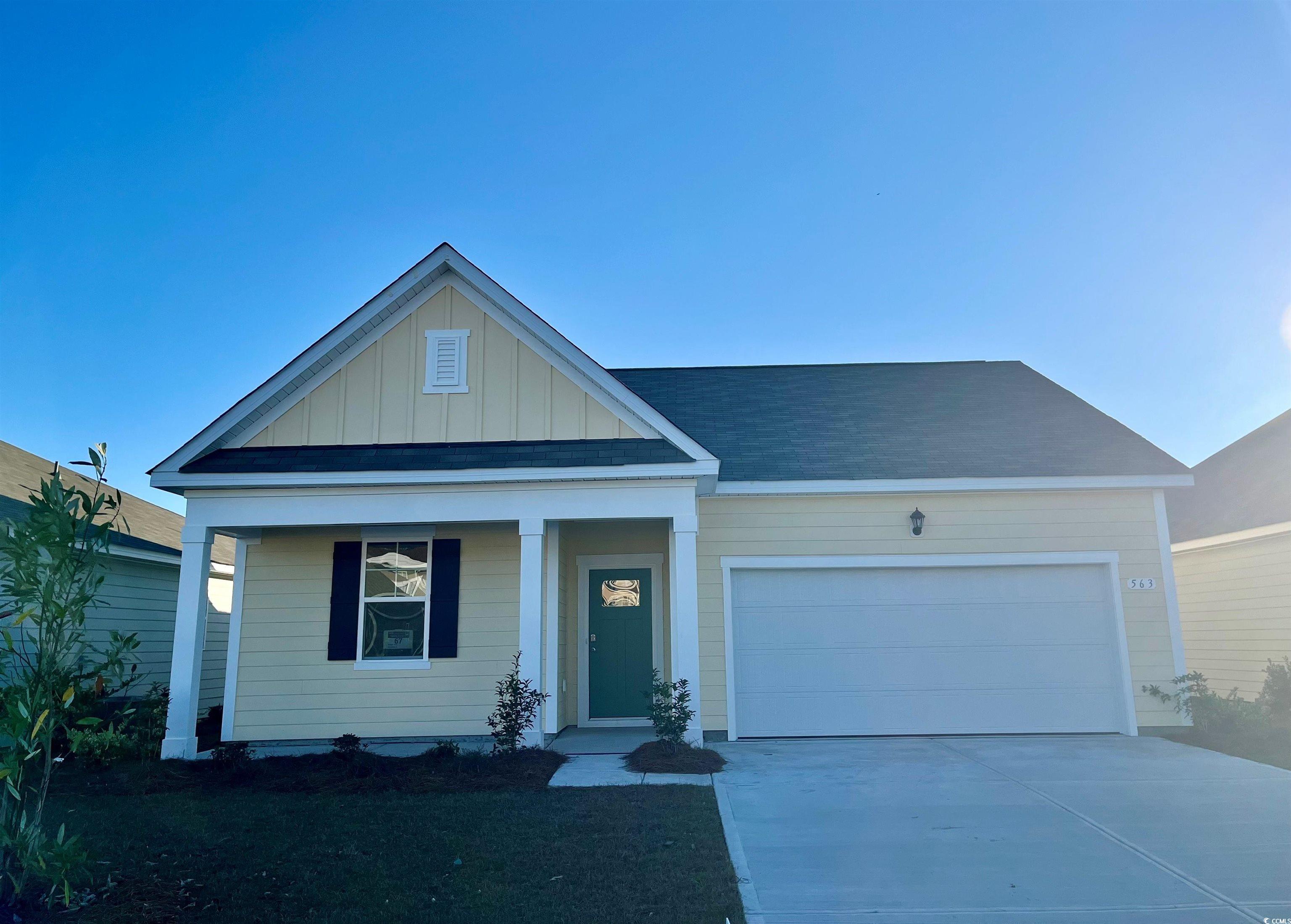 View of front of house with a garage