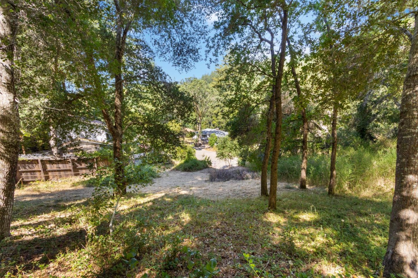 a backyard of a house with lots of green space