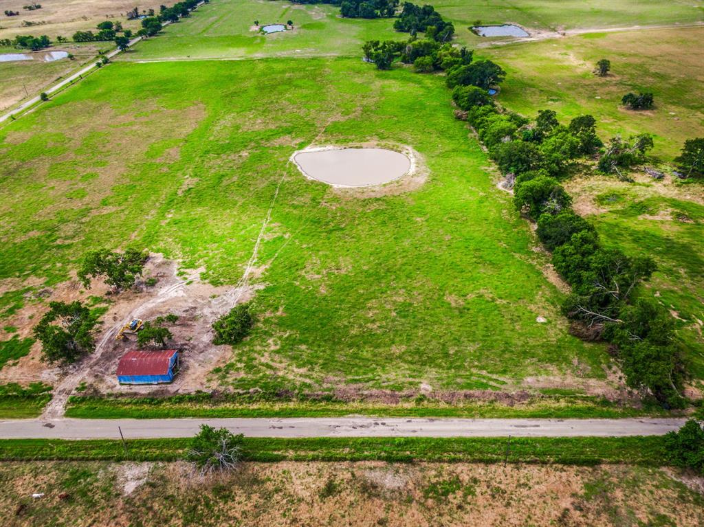 a view of a golf course with a park